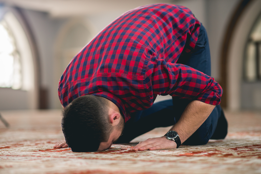 Muslim,Praying,On,The,Ground